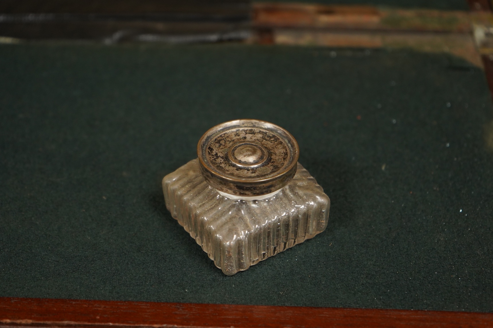 A bird’s-eye maple tea caddy and a brass mounted writing slope, latter 50cm wide